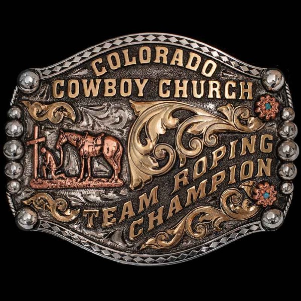 Show off your cowboy style with the Jefferson Belt Buckle. This team roping belt buckle features unique silver beads, bronze scrollwork and diamond stamped edge. Personalize this design now!